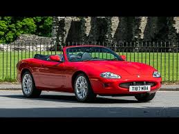 Image result for Phoenix Red 1999 Jaguar