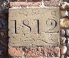 Tchaikovsky, anyone? This stone, set into the top of the middle pilaster - via Daymix