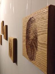 Wood engravings placed in a hallway