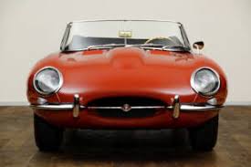 Image result for Carmen Red 1961 Jaguar