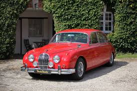 Image result for Maroon 1962 Jaguar