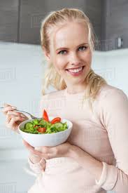Image result for women eating salad and smiling