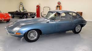 Image result for Silver Blue 1959 Jaguar
