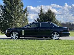 Image result for Black Cherry 2006 Jaguar