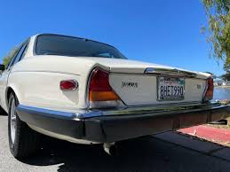 Image result for Nimbus White 1987 Jaguar