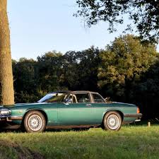 Image result for Poseidon Dark Green 1979 Jaguar