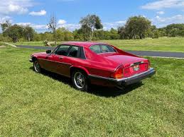 Image result for Grenadier Red 1987 Jaguar