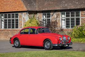 Image result for Carmen Red 1961 Jaguar