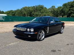 Image result for Black Cherry 2006 Jaguar