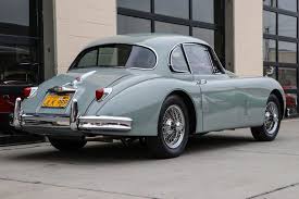 Image result for Silver Blue 1959 Jaguar