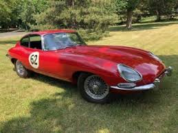 Image result for Maroon 1962 Jaguar