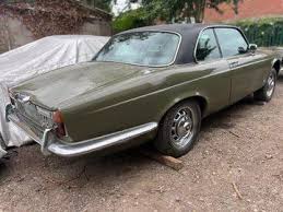 Image result for Carriage Brown 1977 Jaguar