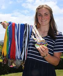 LAUREN PRIESTLEY/ Fairfax NZ. SOLID GOLD: Paige Paterson, 18, of Remuera shows off her collection of cycling medals. - 8044206