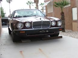 Image result for Burgundy 1983 Jaguar