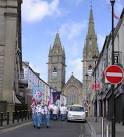 Omagh True Blues band is emerging from Georges Street and entering High - via Daymix