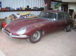 Image result for Maroon 1962 Jaguar
