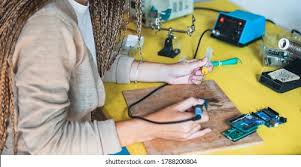 Image result for woman soldering
