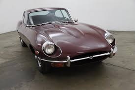Image result for Burgundy 1983 Jaguar