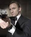 ... Bond and M (Judi Dench) interrogate Mr. White (Jesper Christensen), ... - daniel-craig-photo