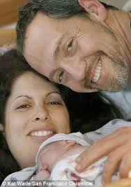 Birth: Bevan Dufty and his best friend, Rebecca Goldfader pose with their baby girl Sidney on October 2 2006 - article-2044974-0E36A04900000578-283_306x436