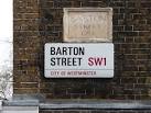 The 1722 sign wins in the aesthetics and charm stakes, but the C20th one - via Daymix