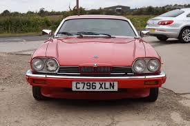 Image result for Sebring Red 1986 Jaguar