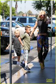 Image result for Queen B by Bumbleride $428 Gwen Stefani and Gavin Rossdale with Kingston and Zuma at the LA zoo