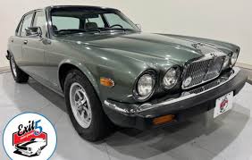 Image result for Poseidon Dark Green 1985 Jaguar