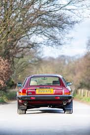 Image result for Sebring Red 1986 Jaguar