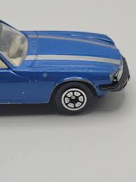 Image result for Quartz Blue 1980 Jaguar