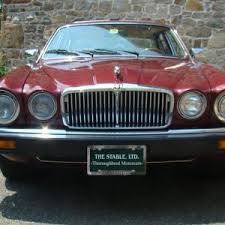 Image result for Sebring Red 1986 Jaguar