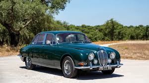 Image result for Dark Blue 1965 Jaguar