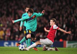 In This Photo: Lionel Messi, Jack Wilshere. Lionel Messi of Barcelona is challenged by Jack Wilshere of Arsenal during the UEFA Champions League round of 16 ... - Lionel+Messi+Jack+Wilshere+Arsenal+v+Barcelona+KCD7Gv6__ULl