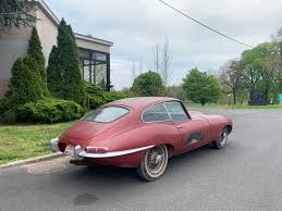 Image result for Maroon 1962 Jaguar