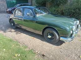 Image result for Dark Green 1959 Jaguar