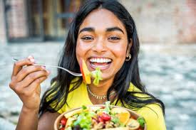 Image result for women eating salad and smiling