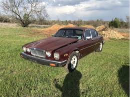 Image result for Burgundy 1983 Jaguar
