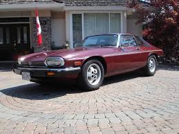 Image result for Sebring Red 1986 Jaguar