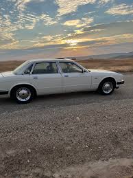 Image result for Glacier White 1988 Jaguar