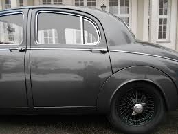 Image result for Silver Gray 1959 Jaguar