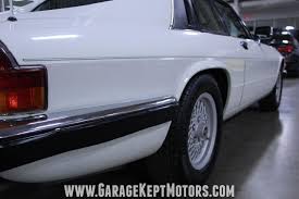 Image result for Glacier White 1989 Jaguar