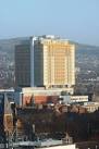 tower block with its characteristic vertical orange coloured stripes. - via Daymix
