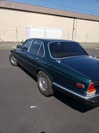 Image result for Poseidon Dark Green 1985 Jaguar