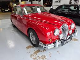 Image result for Carmen Red 1961 Jaguar