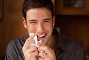 Good table manners show that you're a class act and you think your friends ... - getty_rm_photo_of_man_wiping_mouth_with_napkin