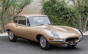 Image result for Golden Sand 1962 Jaguar