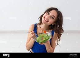 Image result for women eating salad and smiling