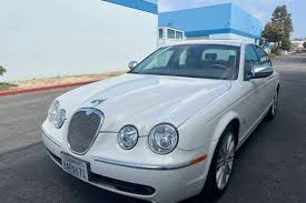 Image result for Winter Gold Pearl 2007 Jaguar