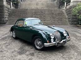 Image result for Dark Green 1959 Jaguar