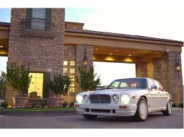 Image result for Nimbus White 1987 Jaguar